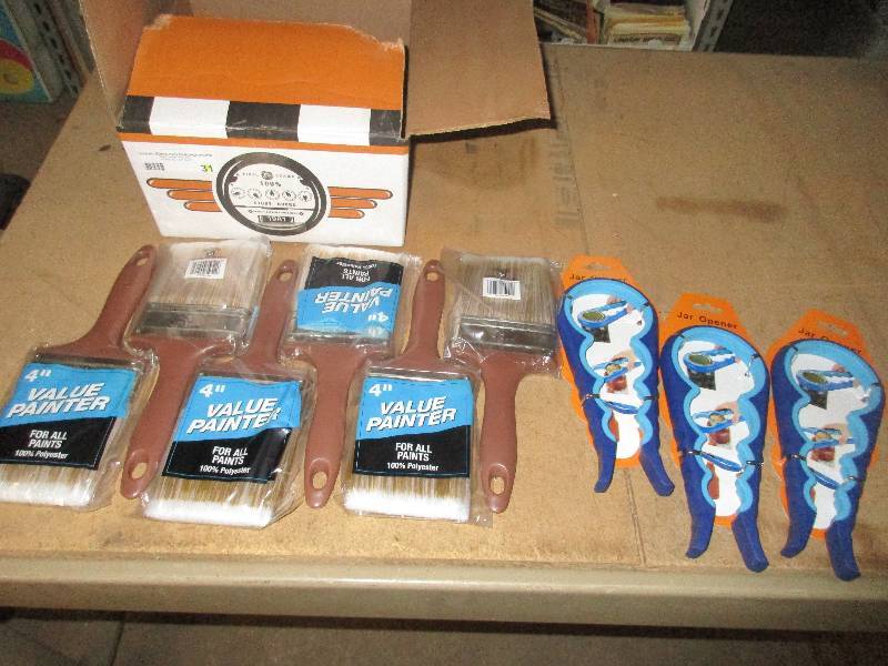 lot 31 image: 6- 4 paint brushes and 3 jar openers