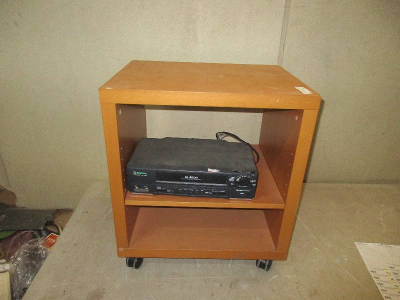 lot 68 image: wood shelf on wheels with VCR