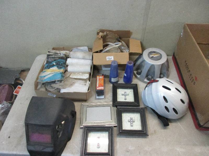 lot 93 image: misc stuff kids helmet - welding helmet - fiberglass mesh - 20 bike tube - chevy 8 lug center cap - hose