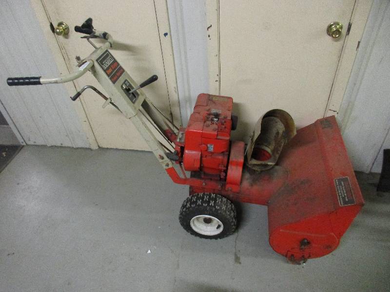 lot 99 image: Montgomery ward dual stage snow plow power reverse 5 hp