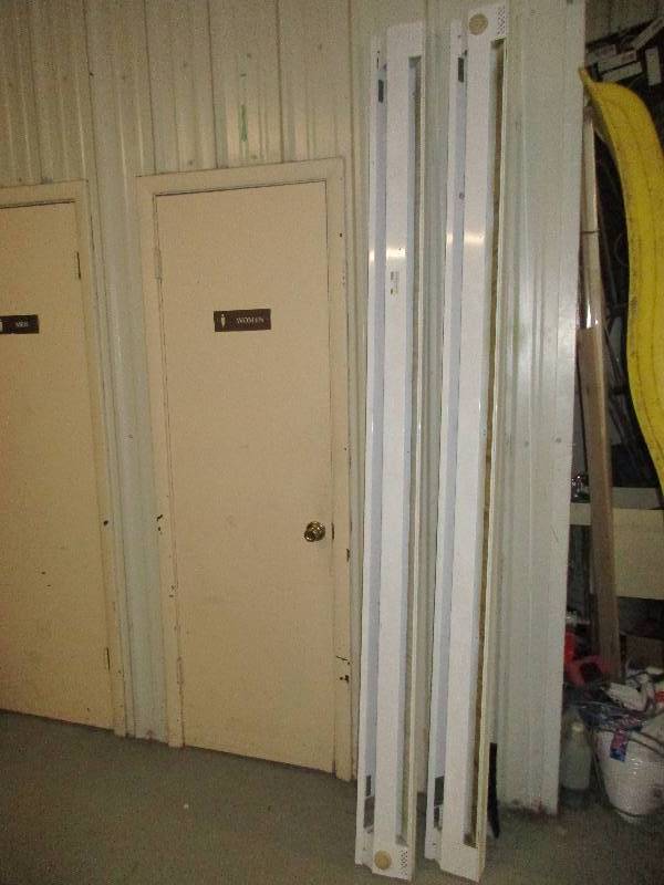 lot 106 image: 2 electric 8 ft radiator heaters