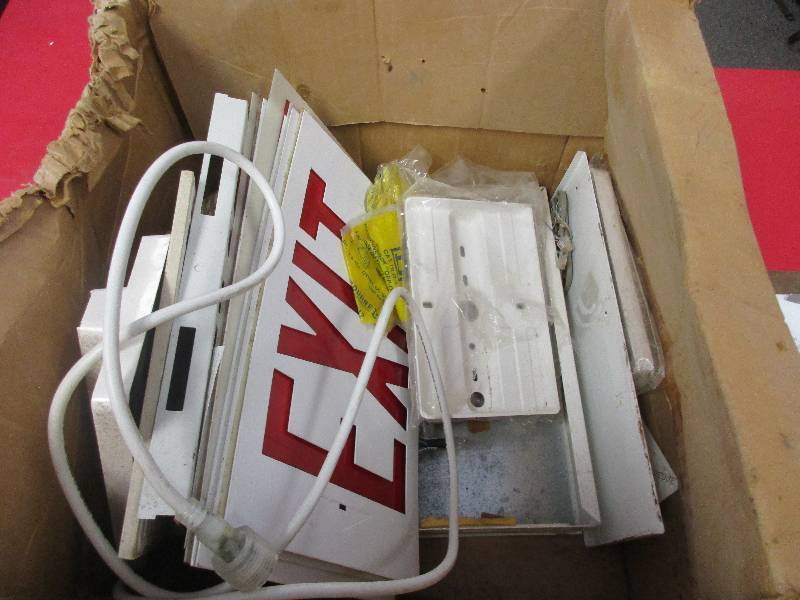 lot 116 image: box of exit sign parts