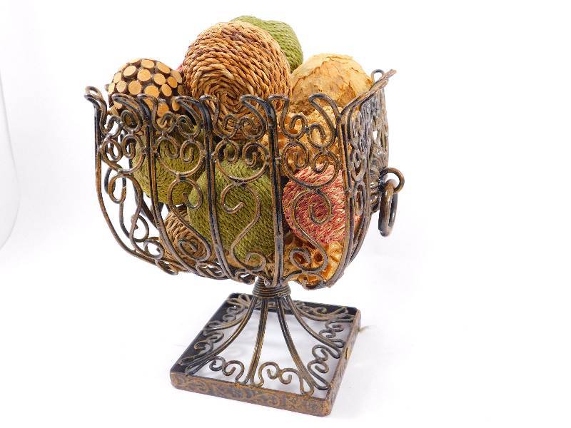 lot 22 image: Pier 1 Metal Basket filled with Decorative Spheres