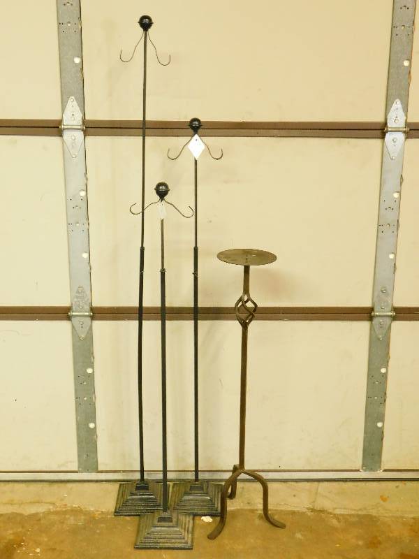 lot 34 image: Lot of Adjustable DrapeLantern Poles and 1 Candle Holder
