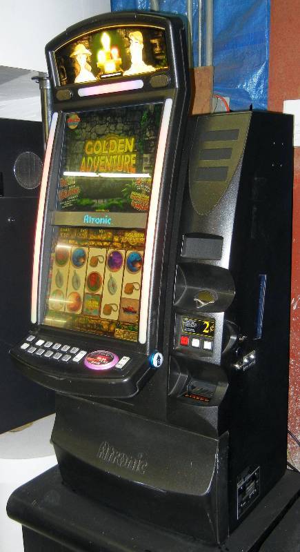 lot 1010 image: ATRONIC GOLDEN ADVENTURE DUAL-SCREEN VIDEO SLOT MACHINE