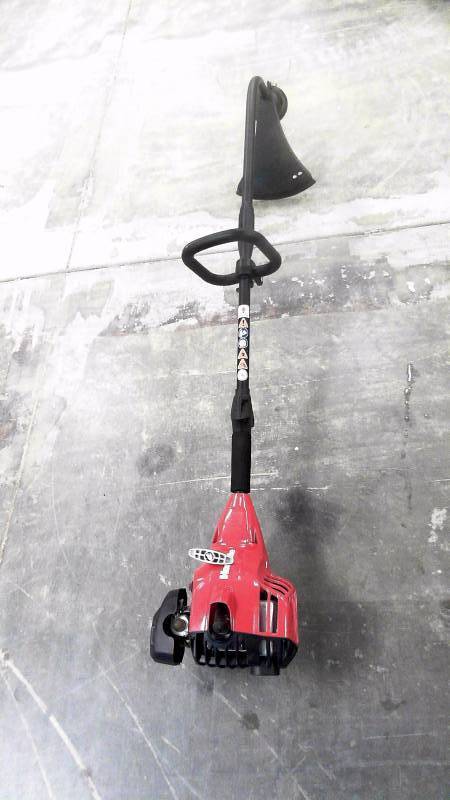 lot 539 image: Homelite UT33600A Gas Powered Weed Whip