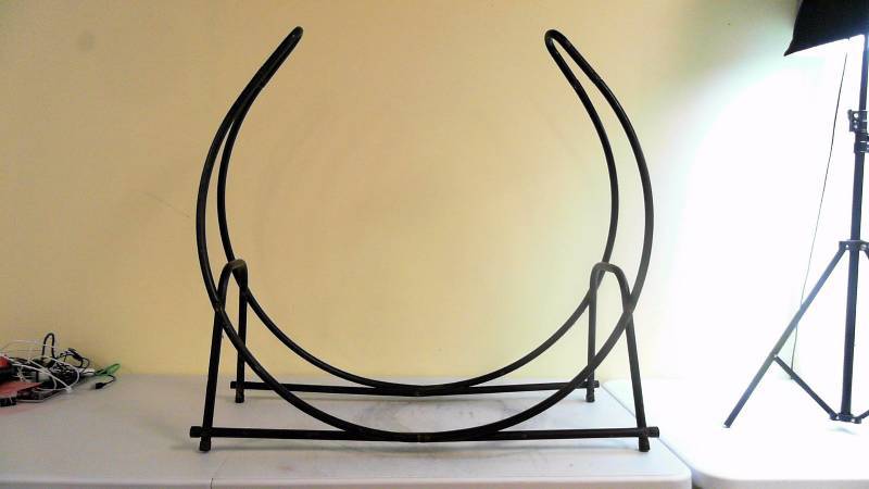 lot 556 image: Unbranded Horseshoe Log Holder