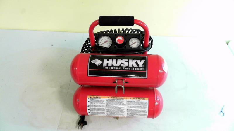 lot 583 image: Husky 4 Gallon Twin Tank Compressor With Hose