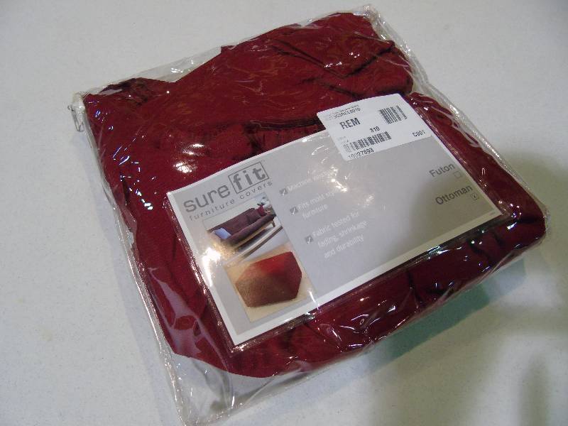 lot 80 image: Sure Fit Cotton Duck Ottoman Slipcover - Claret Red