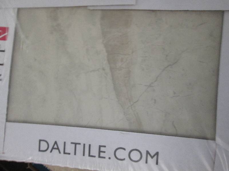 4 boxes of daltile ceramic wall til...