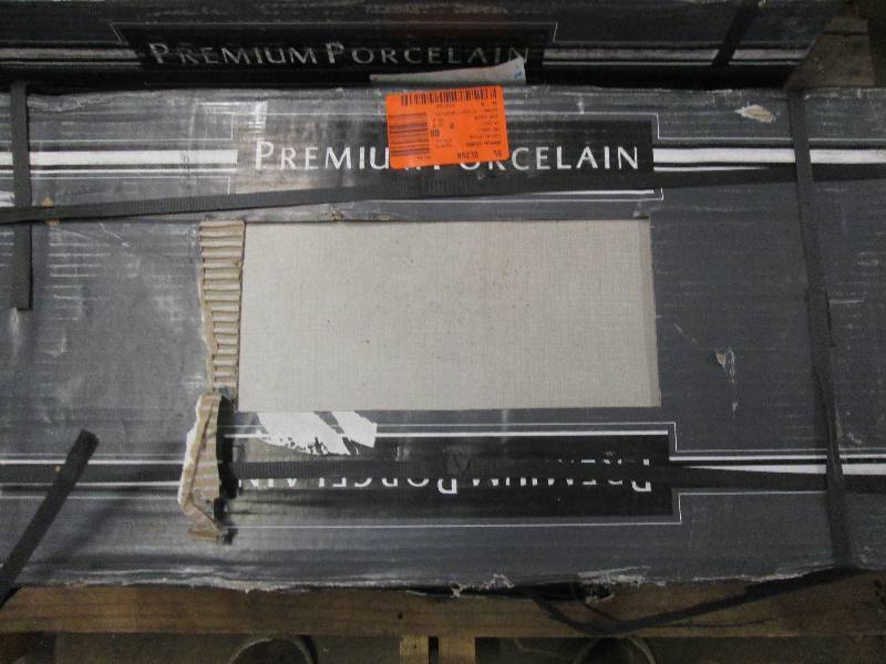 4 boxes of premium porcilain tile 1...