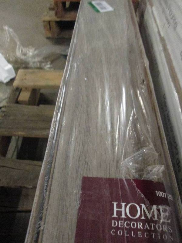 3 boxes of home decorators 12mm lam...