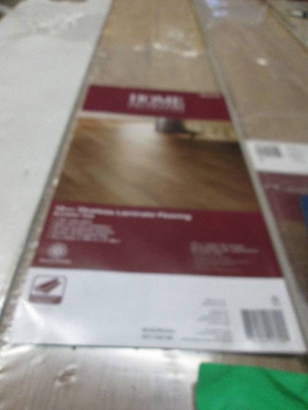 4 boxes of home decorators 12mm glu...