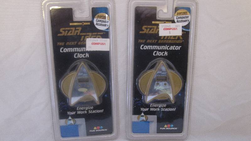 lot 31 image: lot of Two 1997 Star Trek Communicator Clocks
