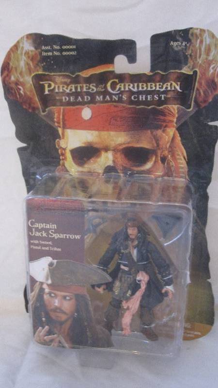 lot 51 image: New sealed Pirates of the Caribbean Jack Sparrow Figure