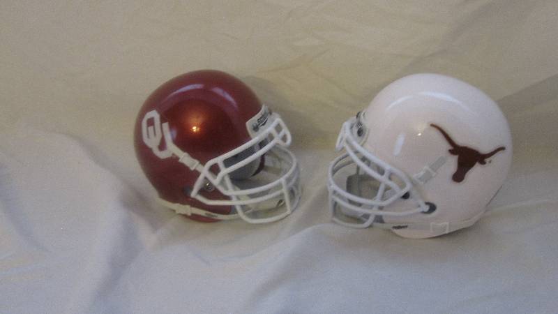 lot 103 image: Schutt replica Oklahoma and Texas mini helmets