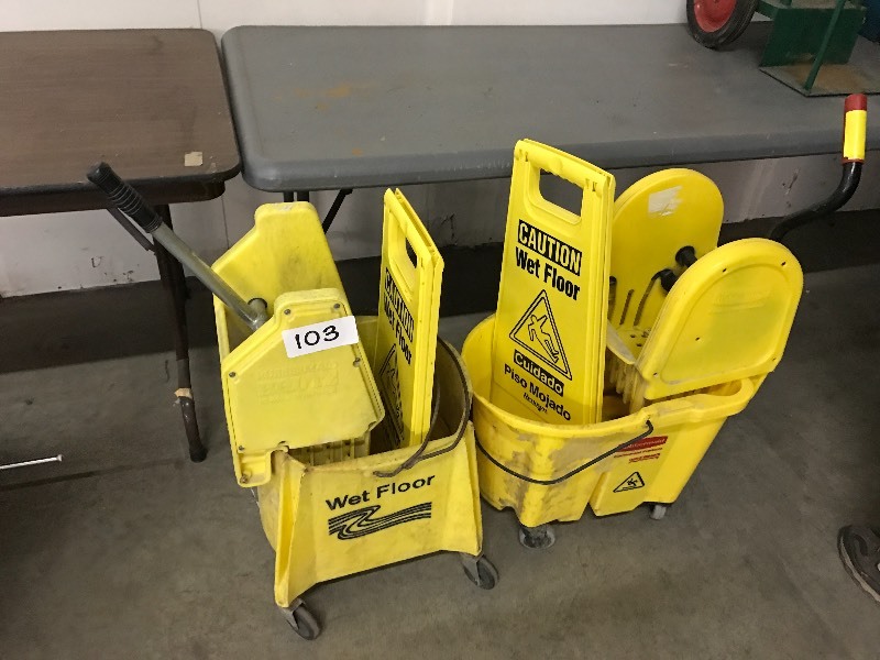 Lot of 2 mop buckets and signs