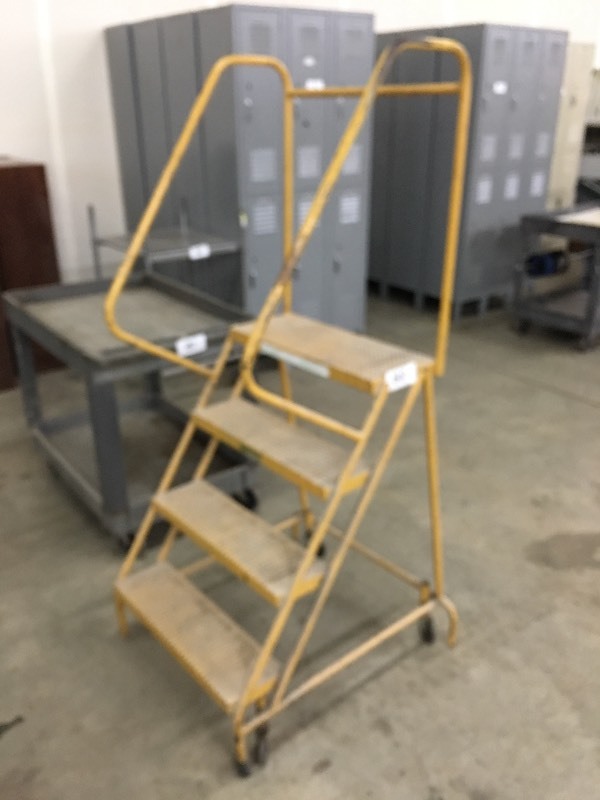 Metal warehouse safety ladder