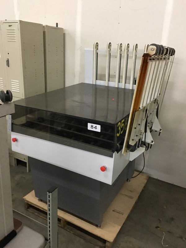 Sheet stock conveyor