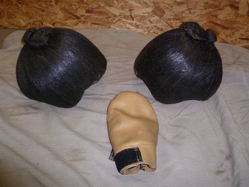 lot 79 image: 2 Sumo Wrestling Helmets and extra Mitts