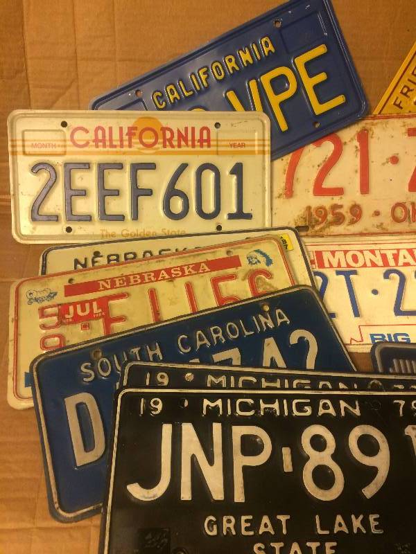 lot 76 image: Assorted Vintage License Plates