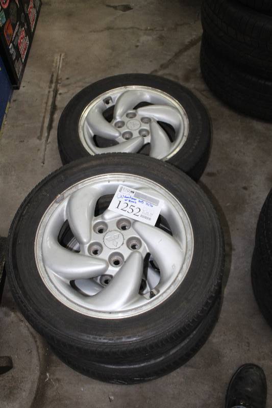Lot of (4) 5-Bolt Mitsubishi Wheels w Goodyear P20555R16 Tires