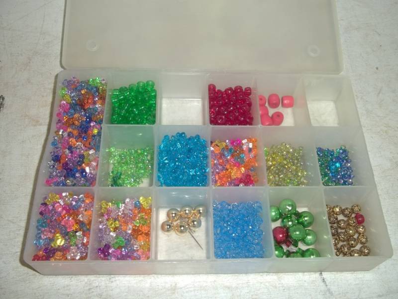 lot 24 image: Kraft Parts with Plastic storage container