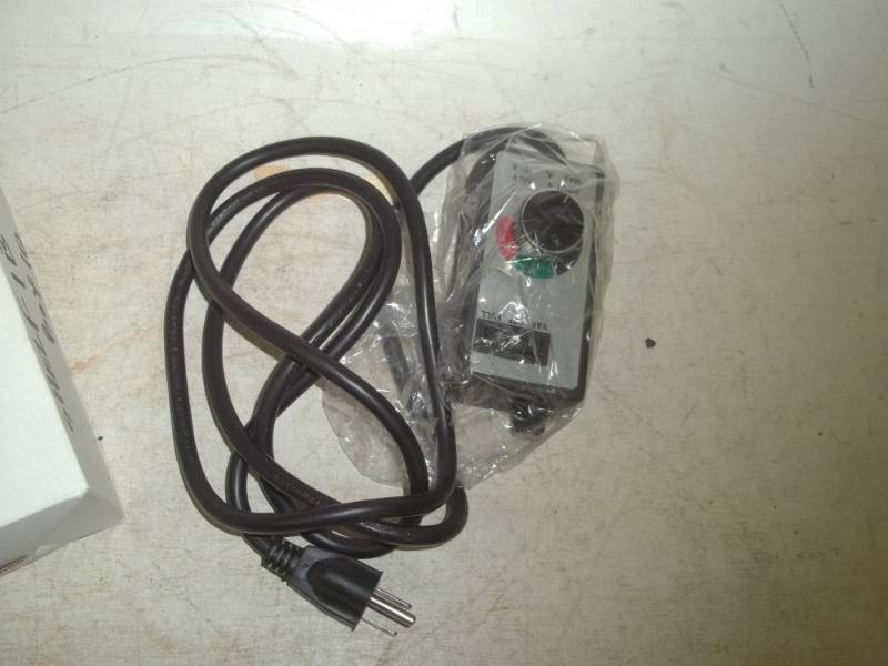 lot 34 image: Router speed control dial