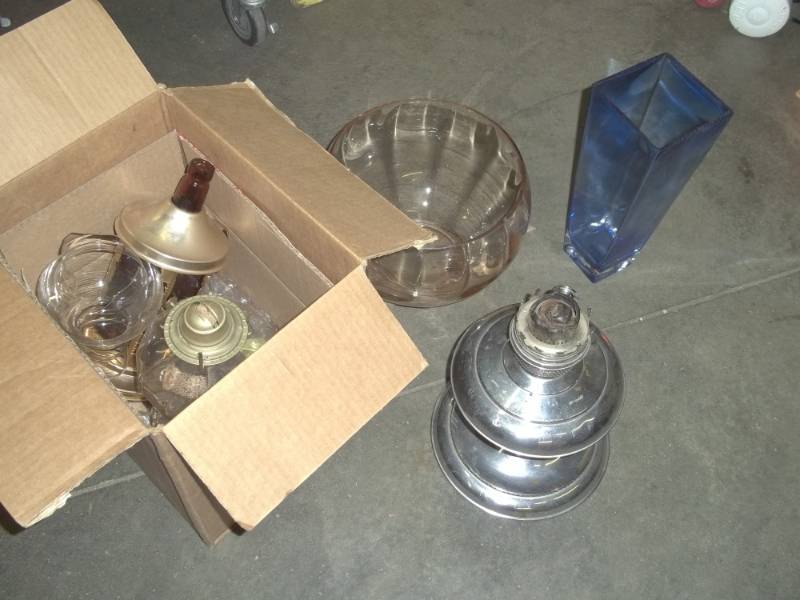 lot 48 image: 2 Kerosene bases one glass one stainless steel, other vases