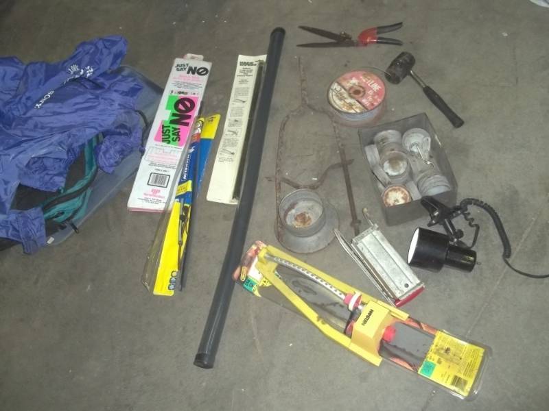 lot 62 image: Wind breaker, magic windshield wipers, vintage canning lids, pruning shears, sprinkler, vintage French fries maker, fencing wire