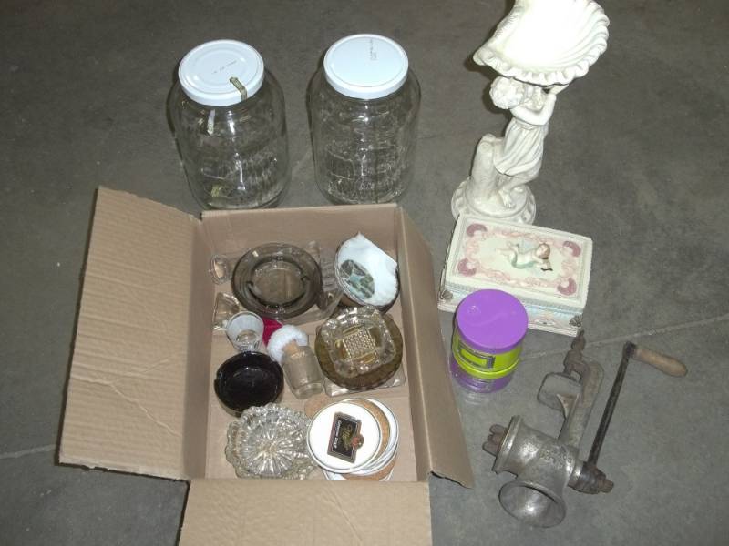 lot 70 image: Meat grinder, ash trays, dcor, gallon jars