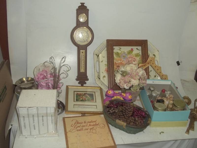 lot 78 image: Assorted salt and pepper shakers, weather station, candle holder, artificial pine cones, picture frame, platter, etc.