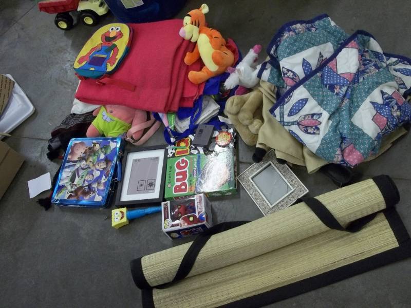 lot 86 image: Assorted games, toys, pillow, blankets, curtain, etc.