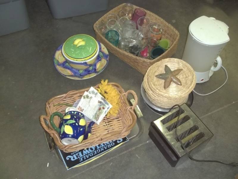 lot 90 image: Toaster, coffeepot, fruit bowls, mason jars, wicker basket, wicker pot holders, can holders, mugs