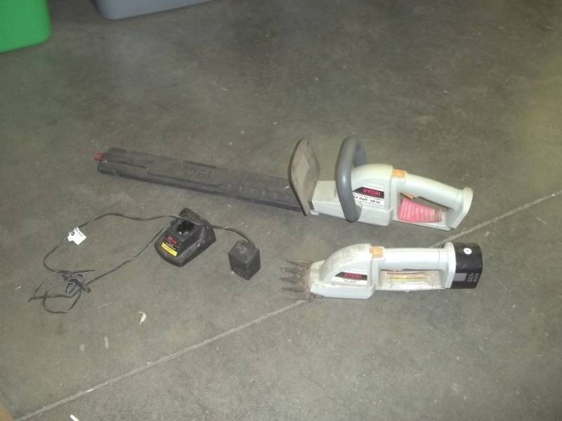 lot 98 image: Ryobi 12 volt hedge trimming kit