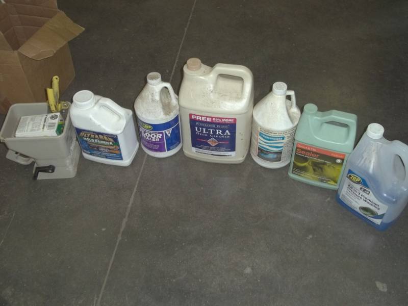 lot 100 image: Grass spreader, pruning shears, pressure washer concentrate, grout and tile sealer, deck cleaner