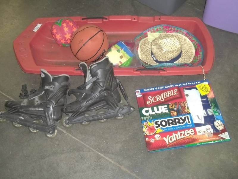 lot 104 image: Kids play assortment, Basketball, salsa hats, sorry game, sled, rollerblades