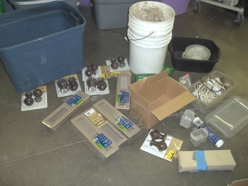 lot 108 image: Floor registers, finials, 5 gallon pails, dimmer switch, and blue tote