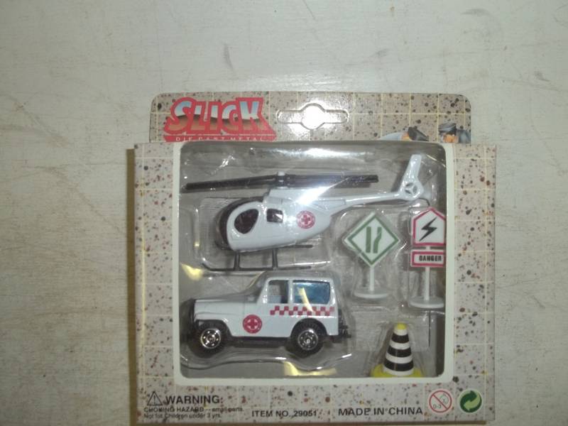 lot 142 image: Toy truck and helicopter
