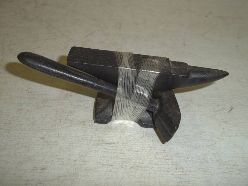 lot 302 image: Miniature anvil and hammer
