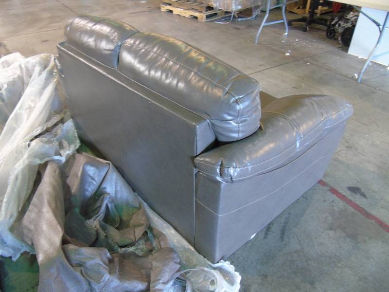 lot 34 image: Ashley Bastrop Loveseat - Gray