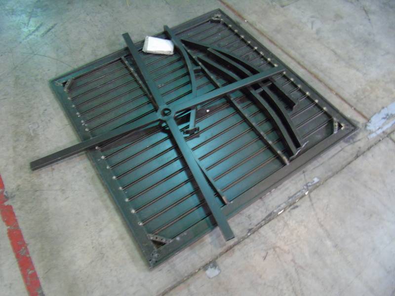 lot 103 image: cosetta metal slat top patio table - Used