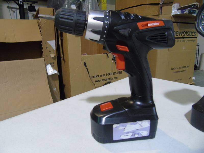 lot 149 image: Drill Master Light and Two Drills with Batteries and Charger - Used