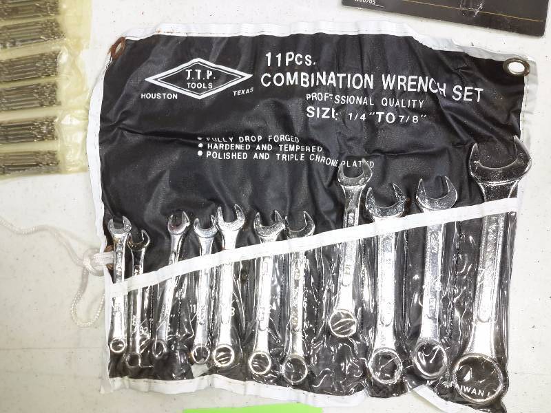 lot 21 image: Misc. Wrench sets and 12, 5 drill sets.  Look at closeups of all included