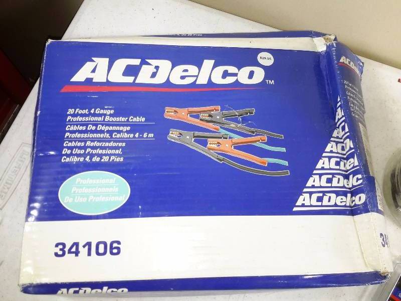 lot 43 image: AC Delco Jumper Cables, Bungee cords, The only Wrench you will ever need