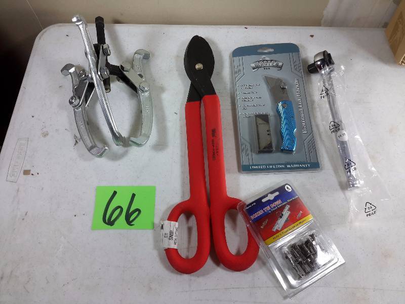 lot 66 image: Large Tin Snips, Bearing Puller, knife, ratchet as pictured