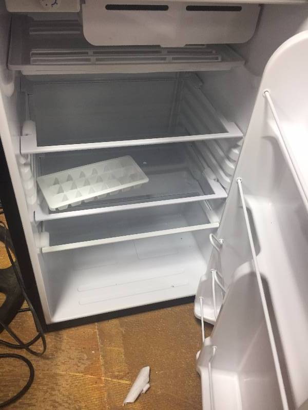 lot 35 image: Haier 4.5 CU FT very scrached on top see pictures not used working well