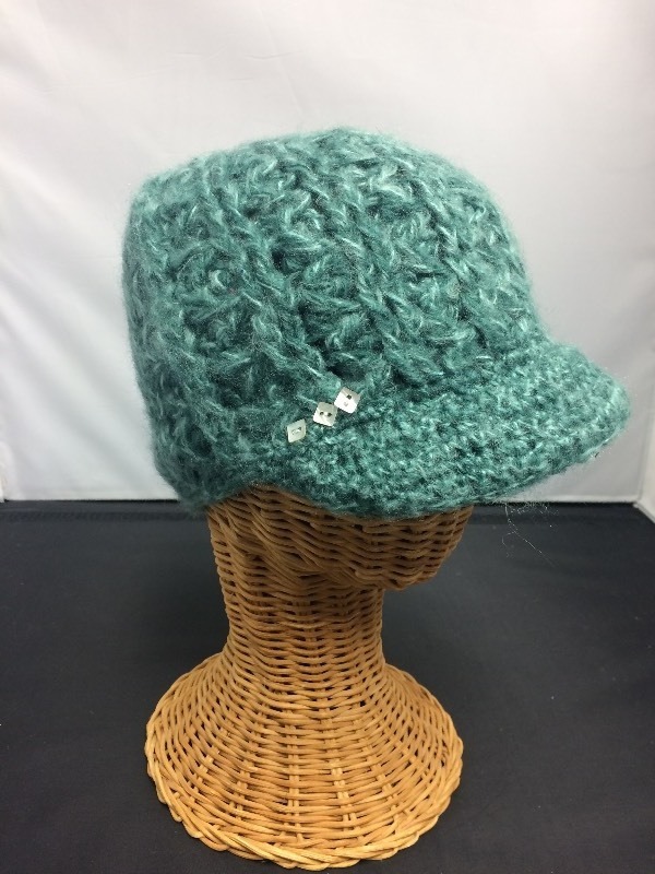 Knitted Womens Fashionable Winter Hat w thick lining.