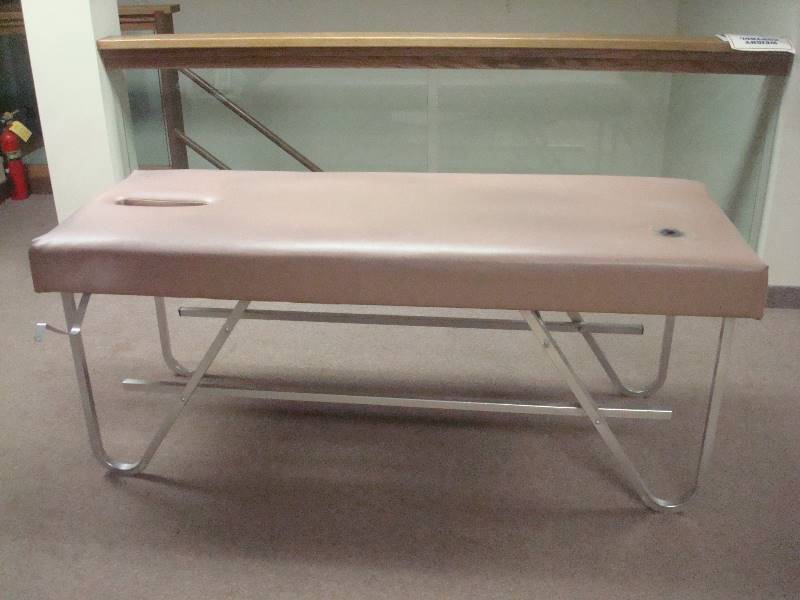 lot 9 image: Chiropractic  Message Table, Used, Shows Wear, Has Burn Hole