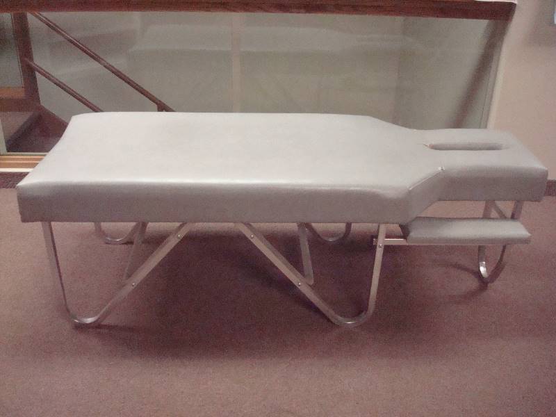 lot 10 image: Chiropractic  Massage Table, Used, Shows Wear, Some Surface Wear, Bottom Board Is Cracked